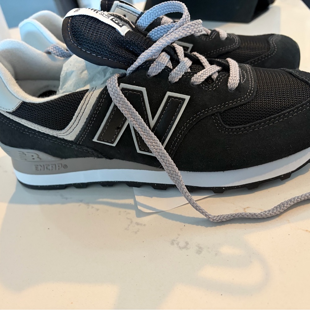 New Balance Black and White Athletic Shoes